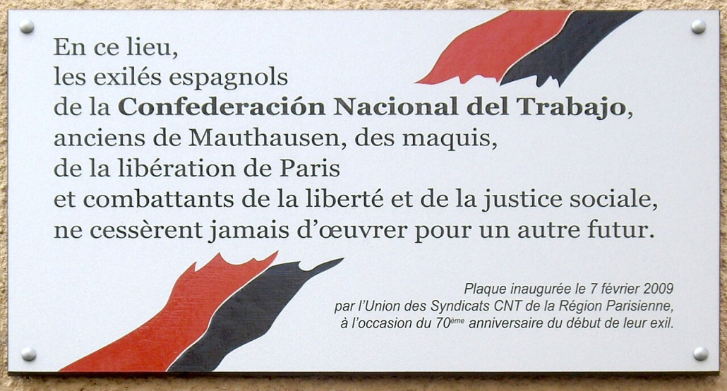 Photographie de la plaque commémorative de la CNT 33 rue des Vignoles Paris 20e